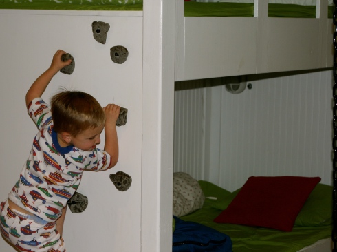 Blaise climbing in bunk